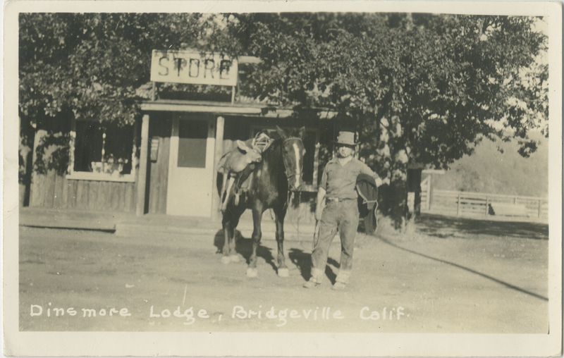 Man with horse and deer kill in front of Dinsmore Store