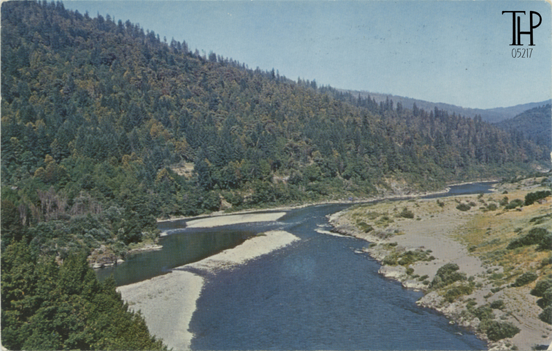 view looking downriver from bridge at Weitchpec